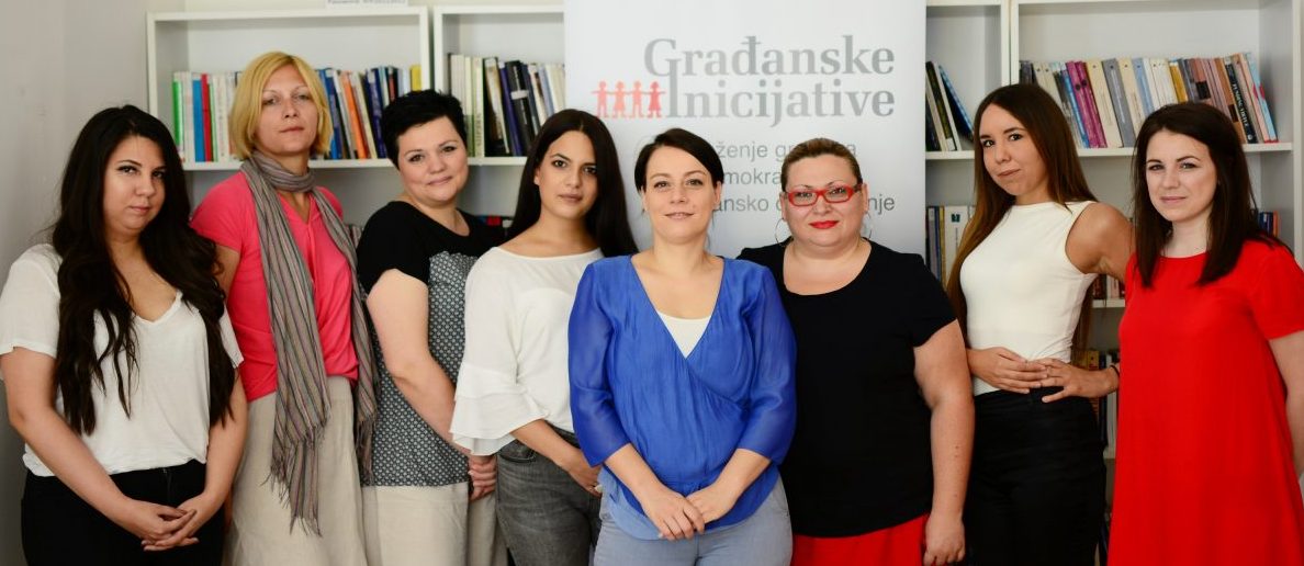 Maja Stojanovic, in the centre in blue, with her staff